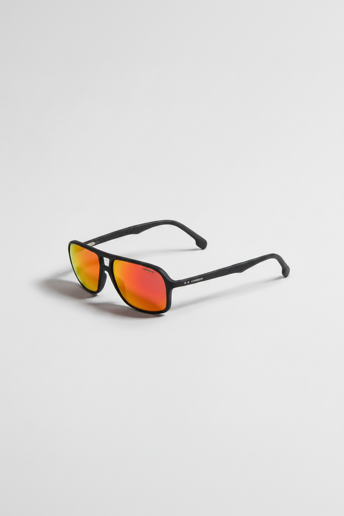 Black sunglasses with vibrant orange-to-yellow mirrored lenses, shown on a clean light gray background.
